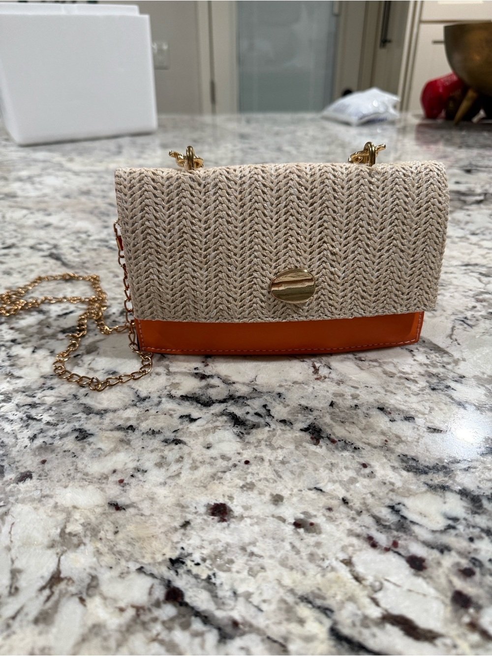 Woven Cream Crossbody Bag with Orange Trim and Gold Chain